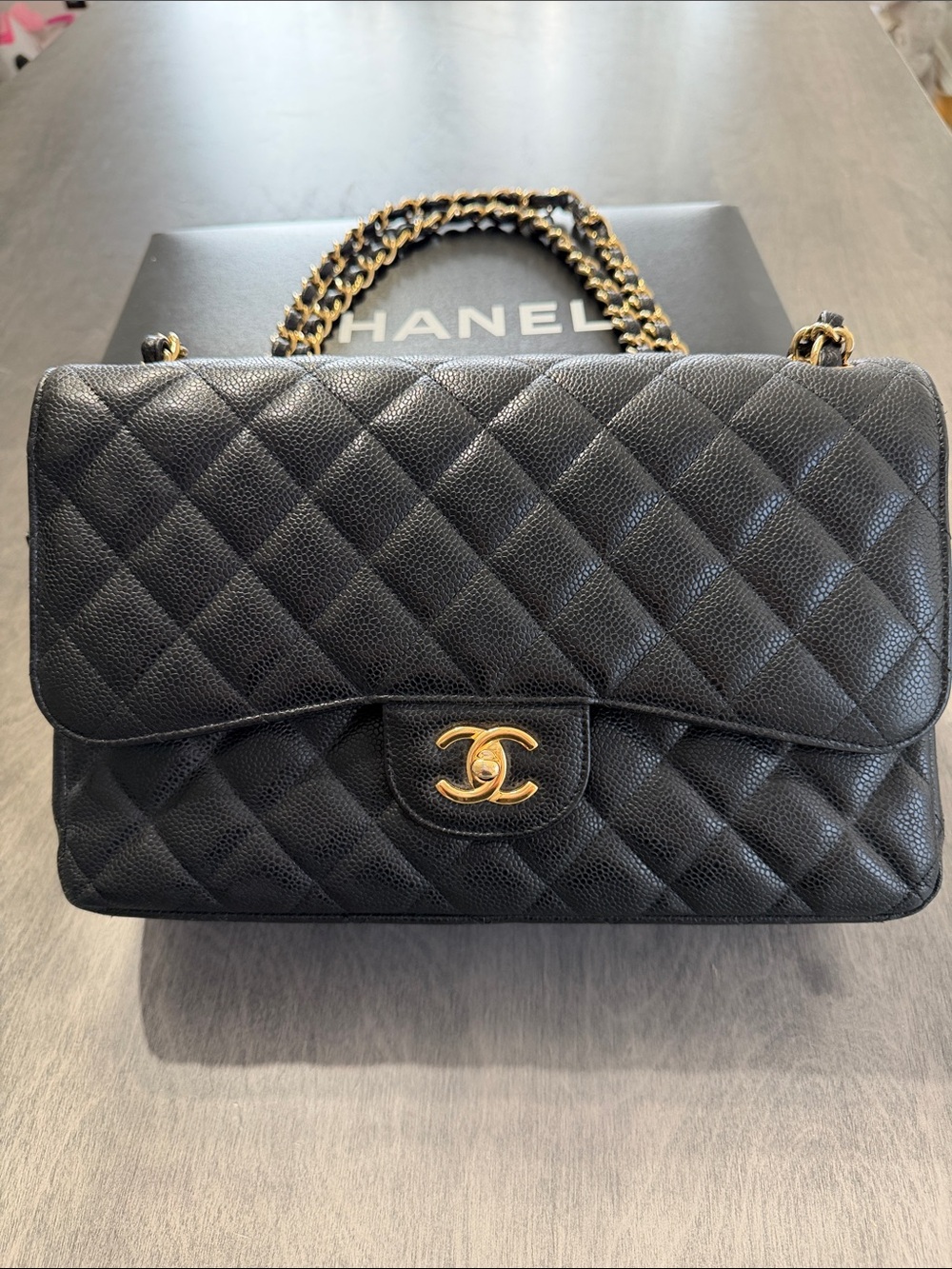 CHANEL Jumbo Classic Flap Black Caviar with Gold Hardware